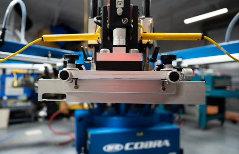 M&R Cobra screen printing press at Arnold Prints in Westlake, Florida