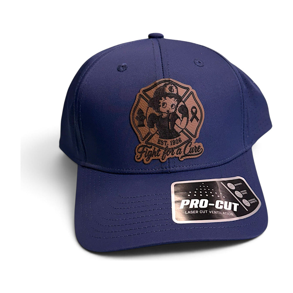 Example of a finished leatherette patch cap: laser engraved rawhide patch heat applied to a navy Sport-Tek Pro-Cut performance cap for Greenacres Fire Rescue